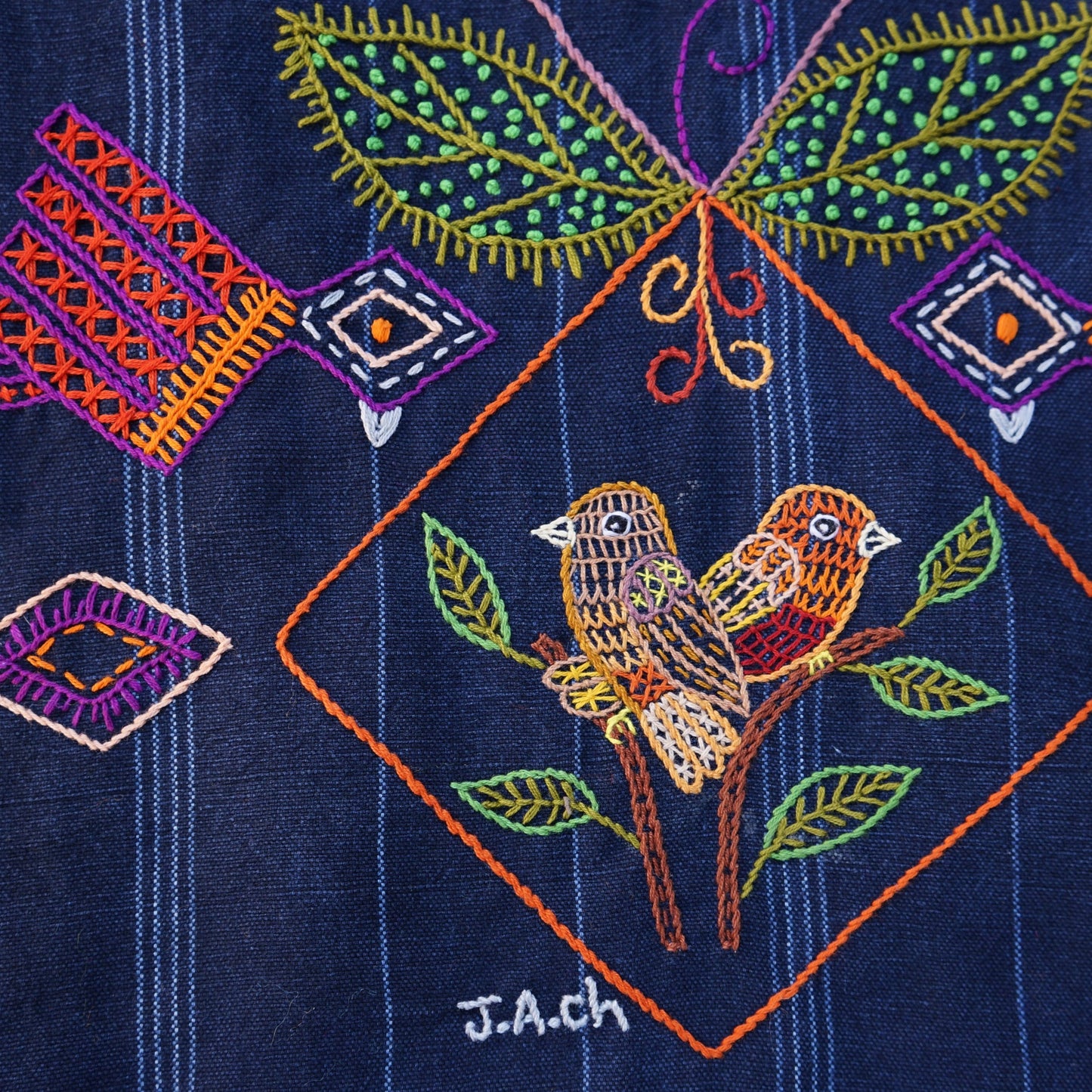 Table runner with pom-poms