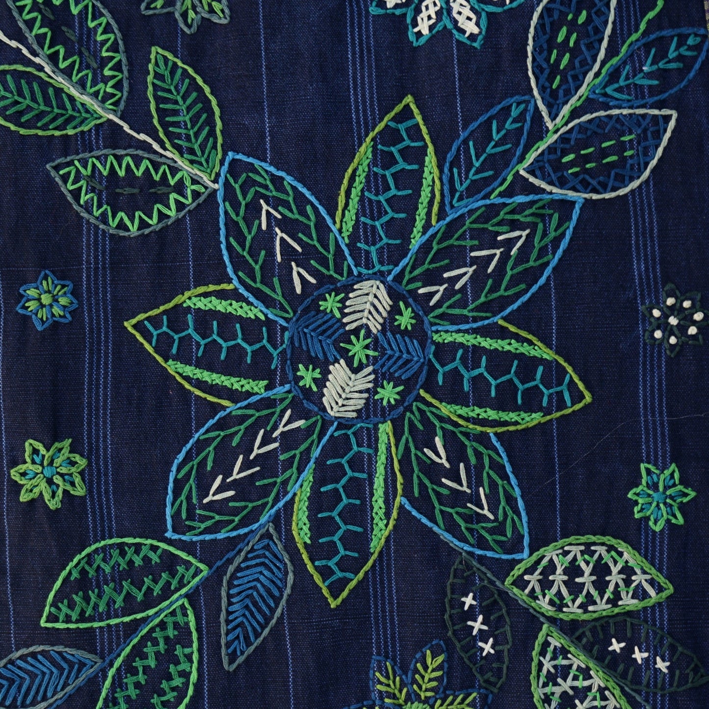 Table runner with pom-poms