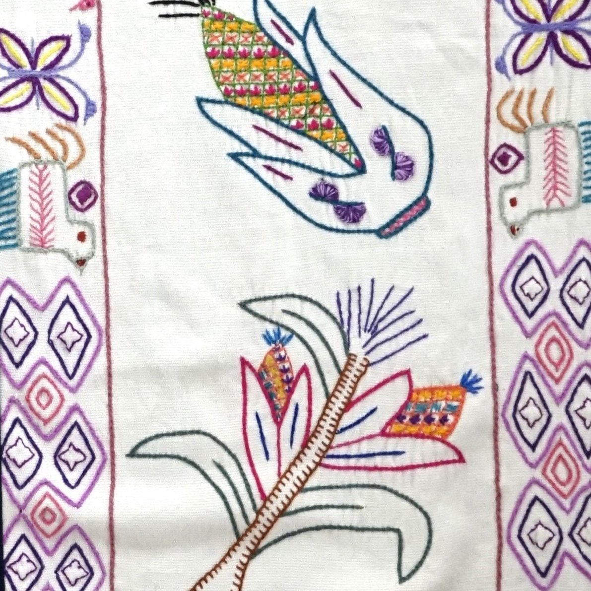 Corn table runner with pom-poms