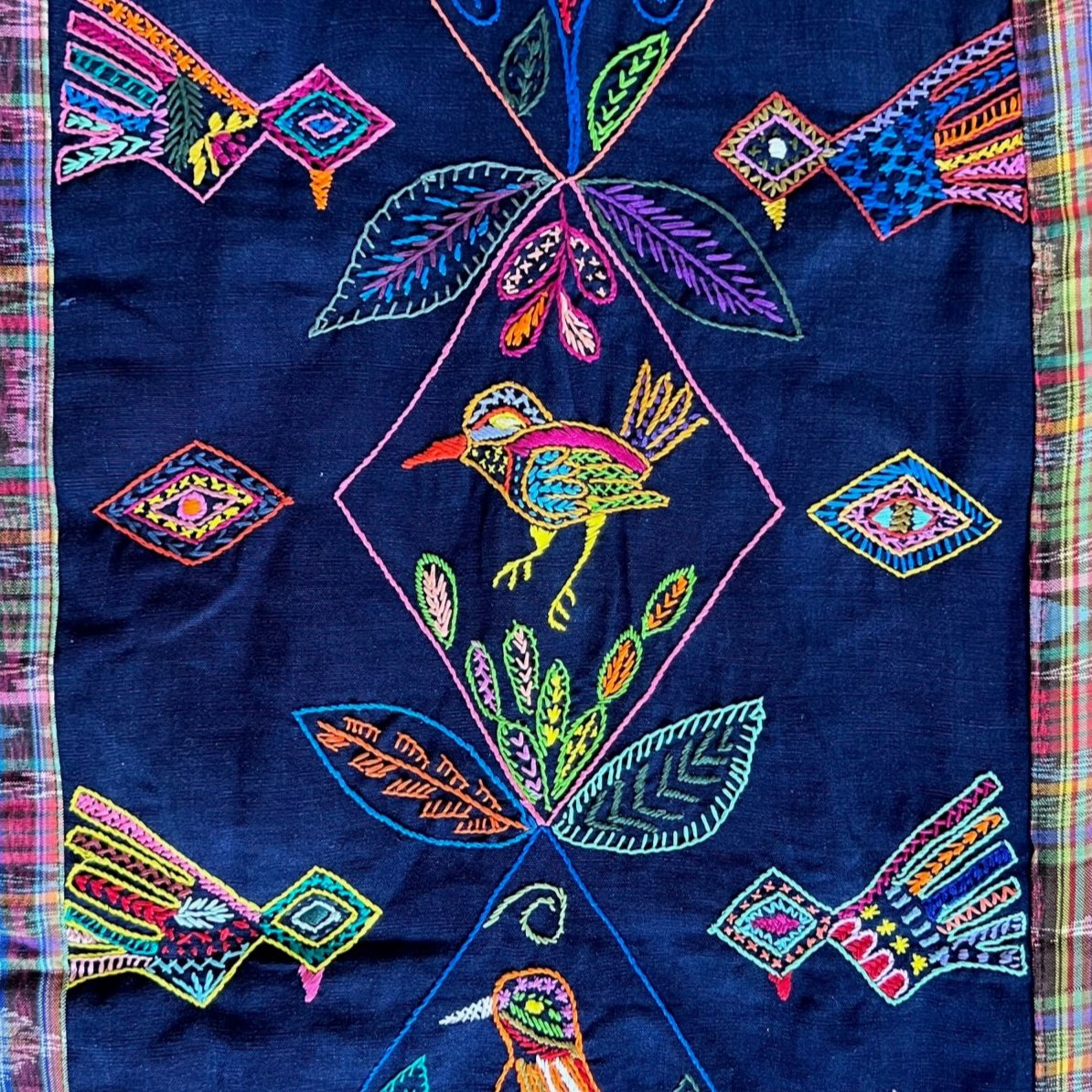 Table runner with pom-poms