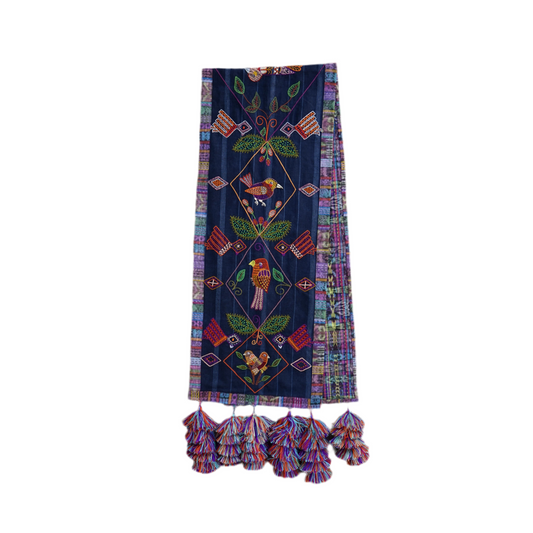 Table runner with pom-poms