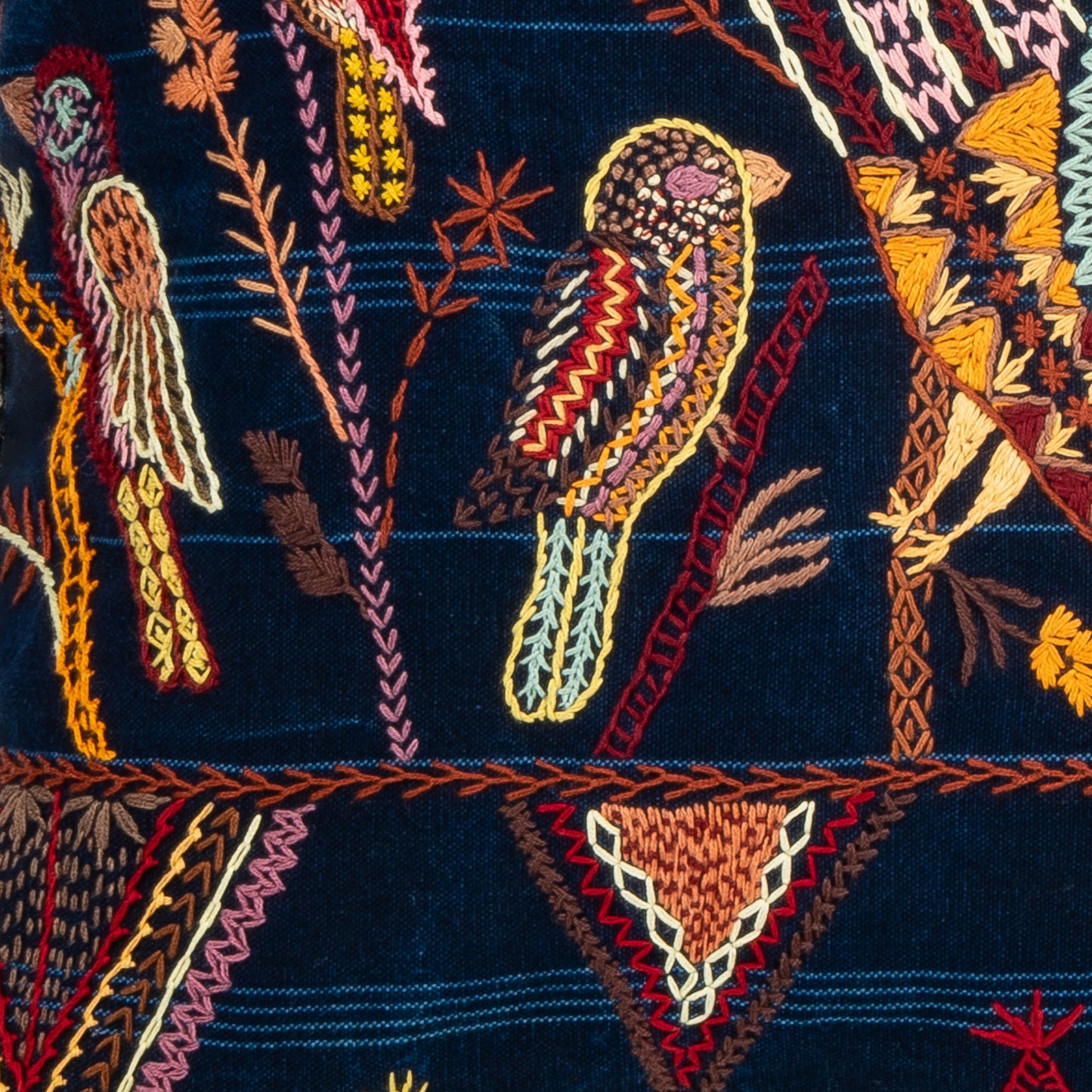 Embroidered Bird and Geometric Pillow