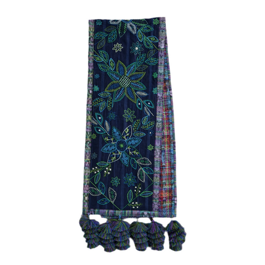 Table runner with pom-poms